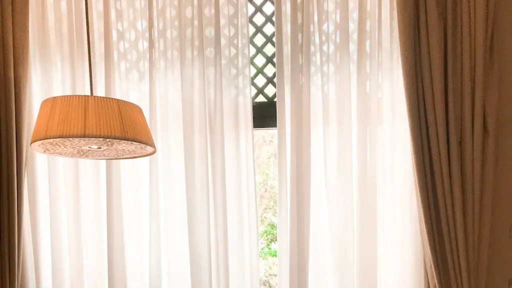 How to get cat hair off curtains?