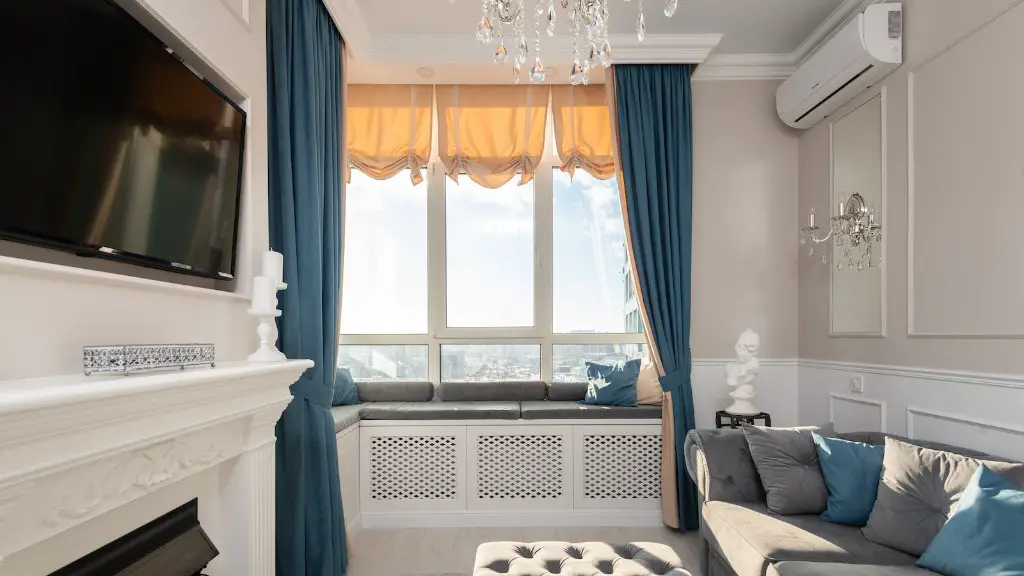 Should curtains touch the floor?