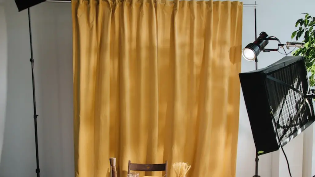 How far outside the window to hang curtains?