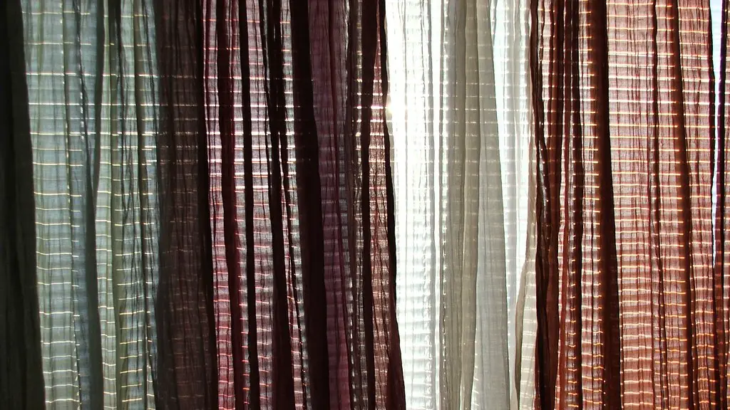 How to hang curtains on vertical blinds?