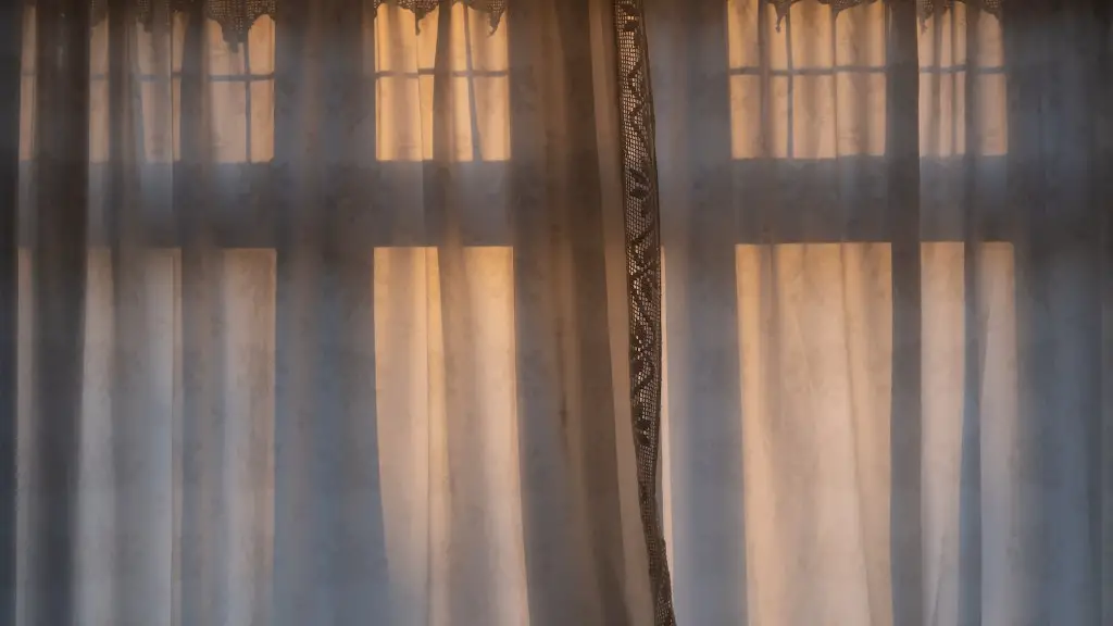 How often should hospital curtains be cleaned?