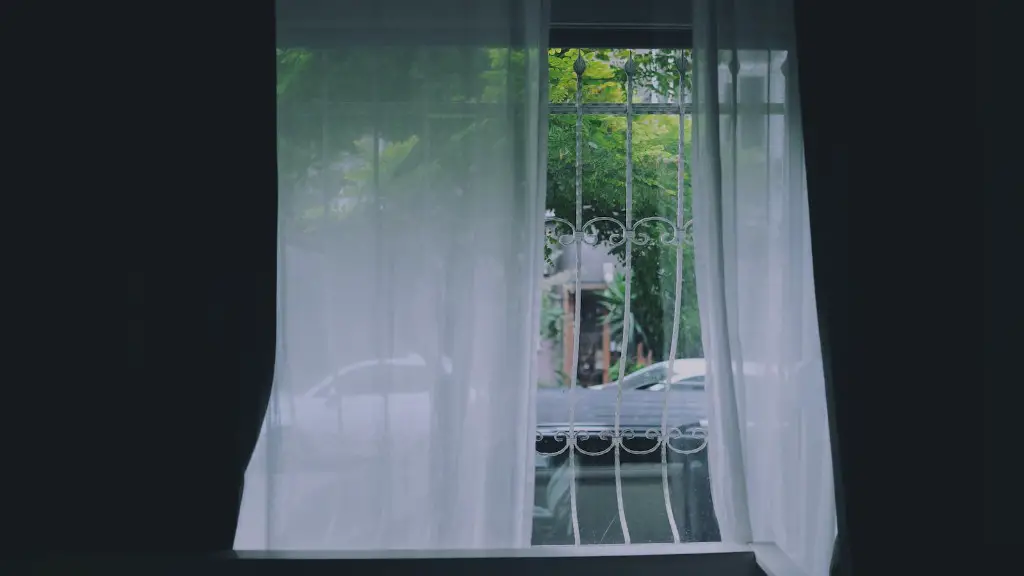 What color curtains go with gray walls and brown furniture?