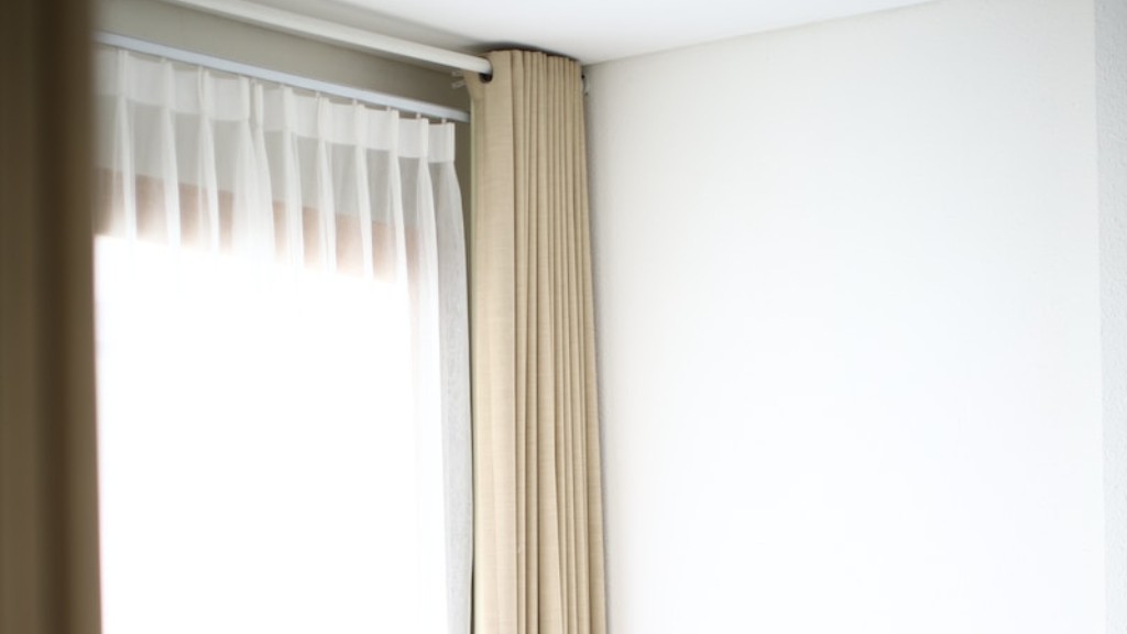 How do you hang curtains in a bay window?
